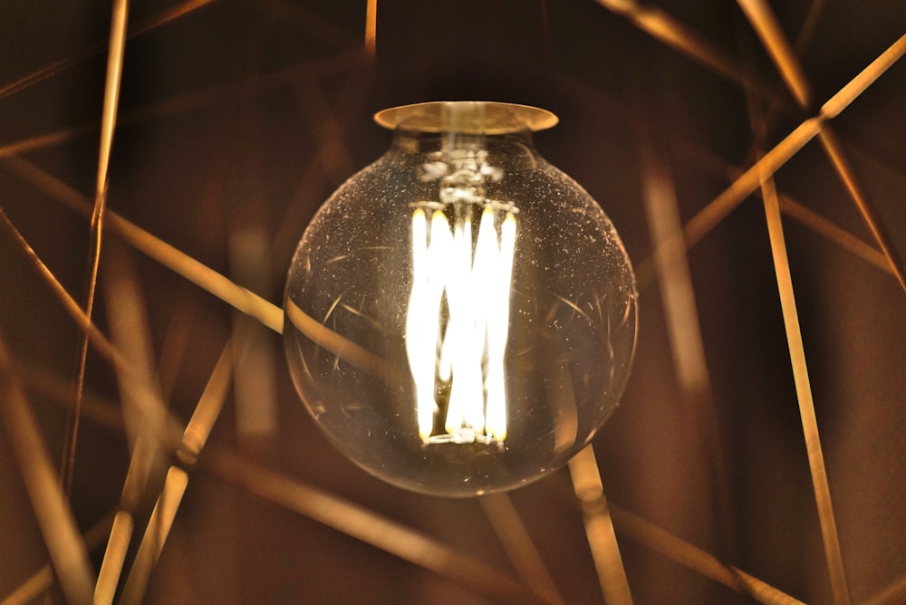 a light bulb hanging from a ceiling in a room