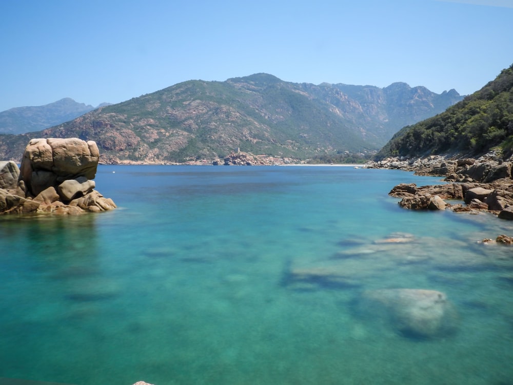 a large body of water surrounded by mountains