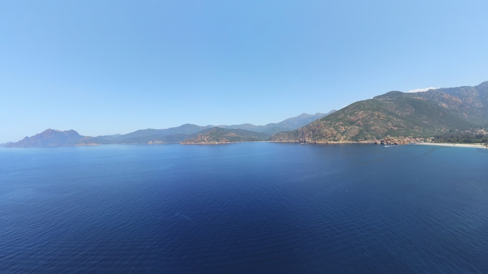 a large body of water surrounded by mountains