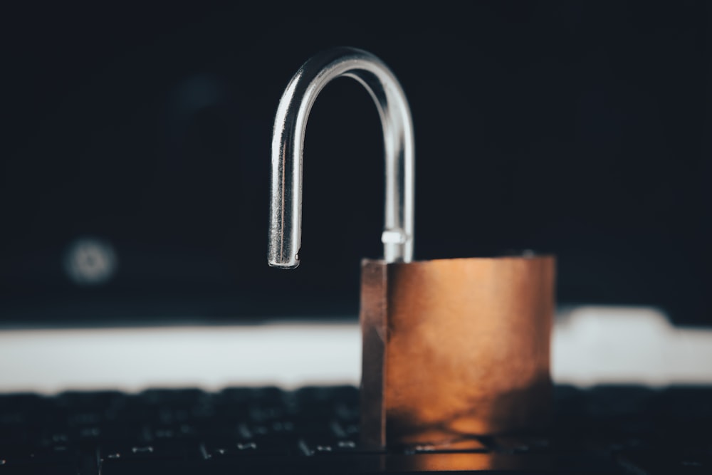 a padlock on top of a laptop computer