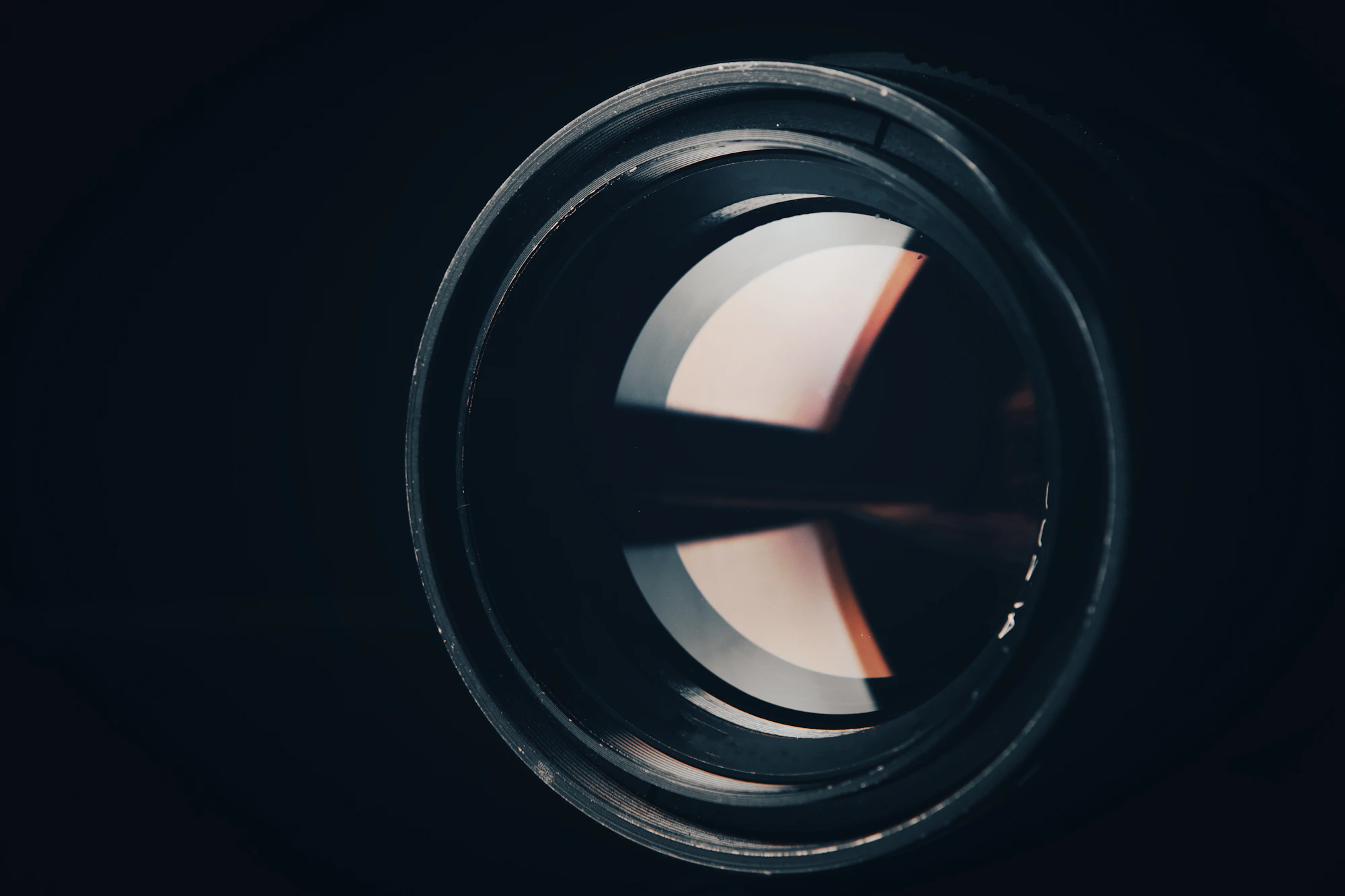 Close detail of a camera lens in soft light