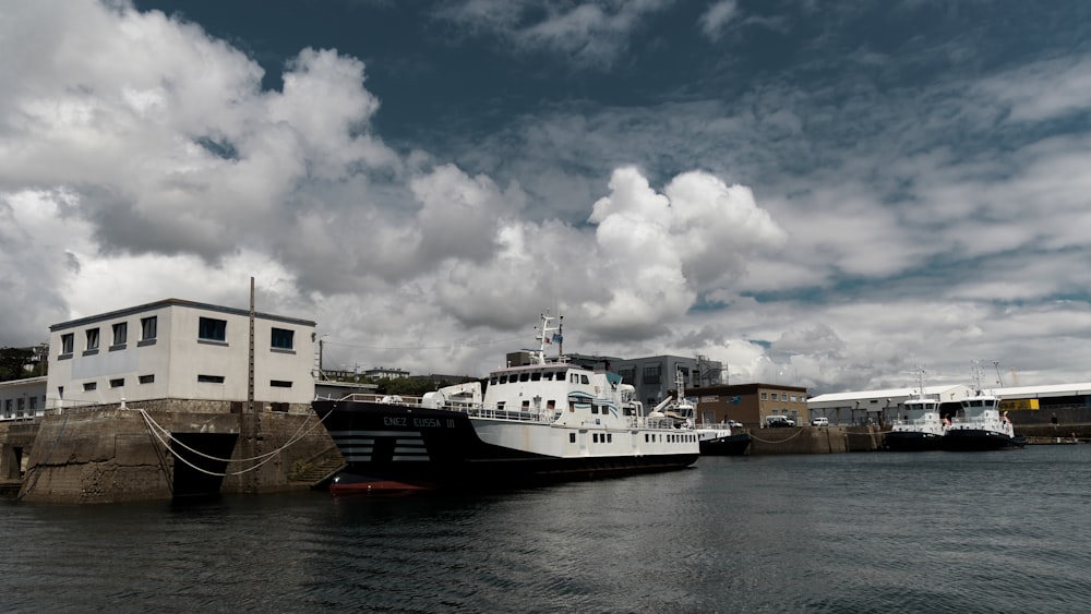 a large boat is docked in the water