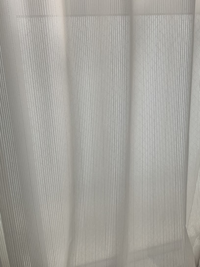 A stylish display of pleated insect screens and curtains.