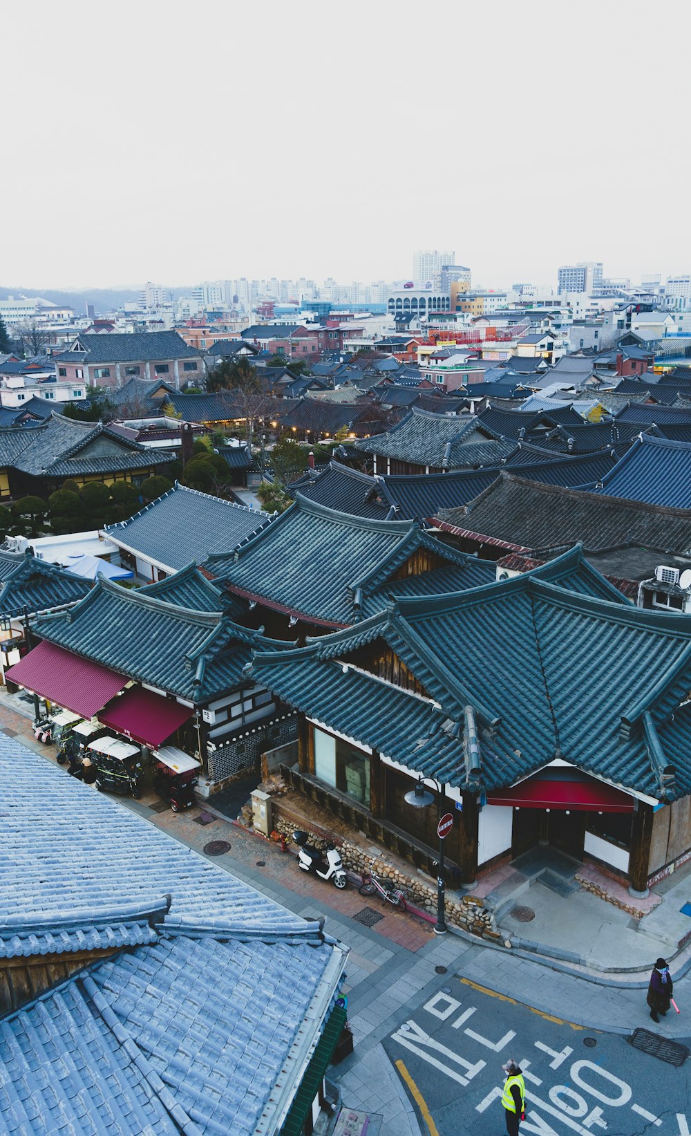 a group of buildings with a sky background