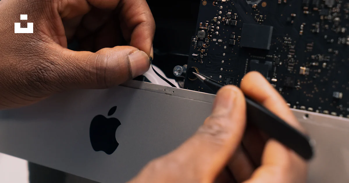 Computer Work Apple A man working on an apple computer photo – Free Apple imac Image on ...