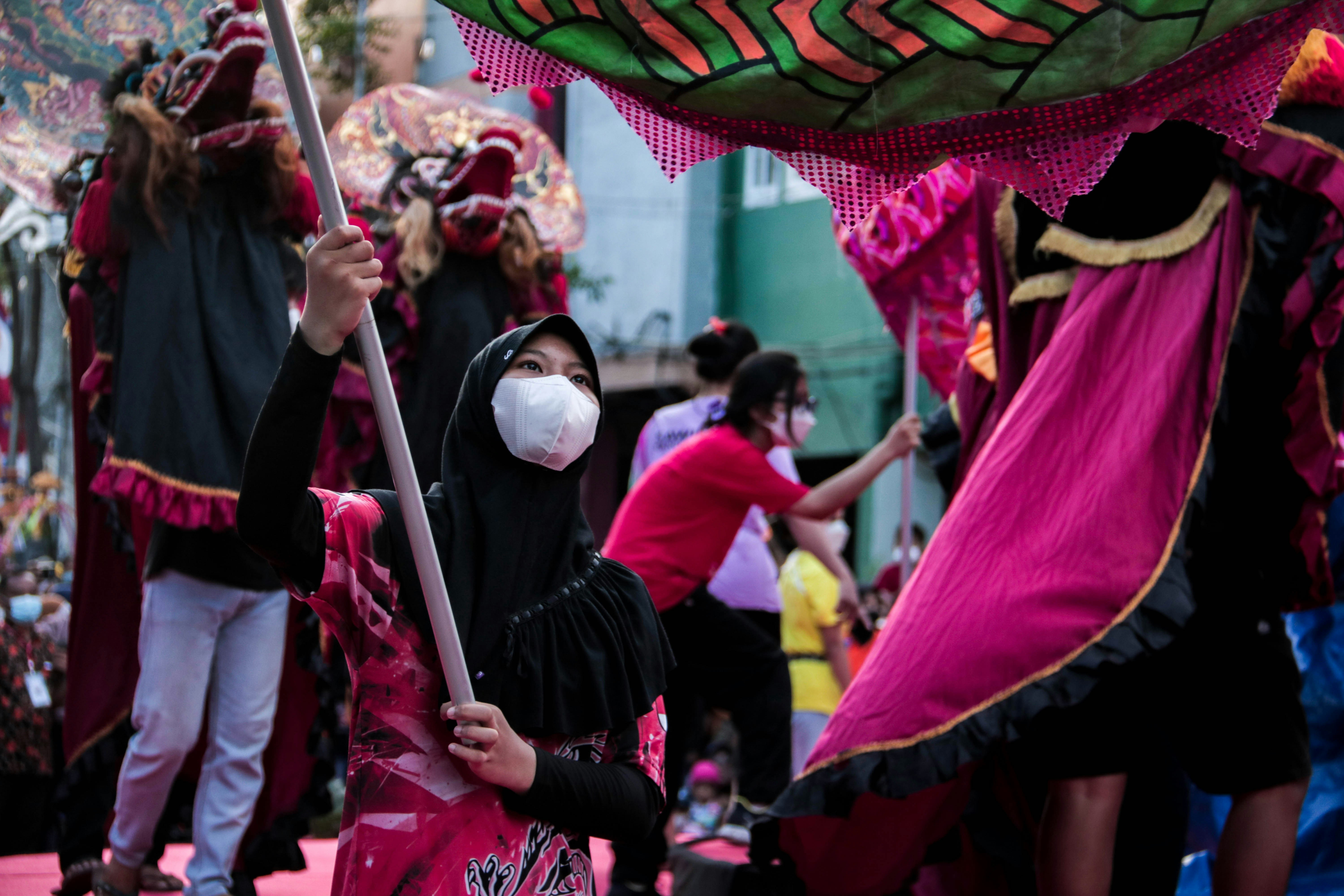 a group of people in costumes and masks