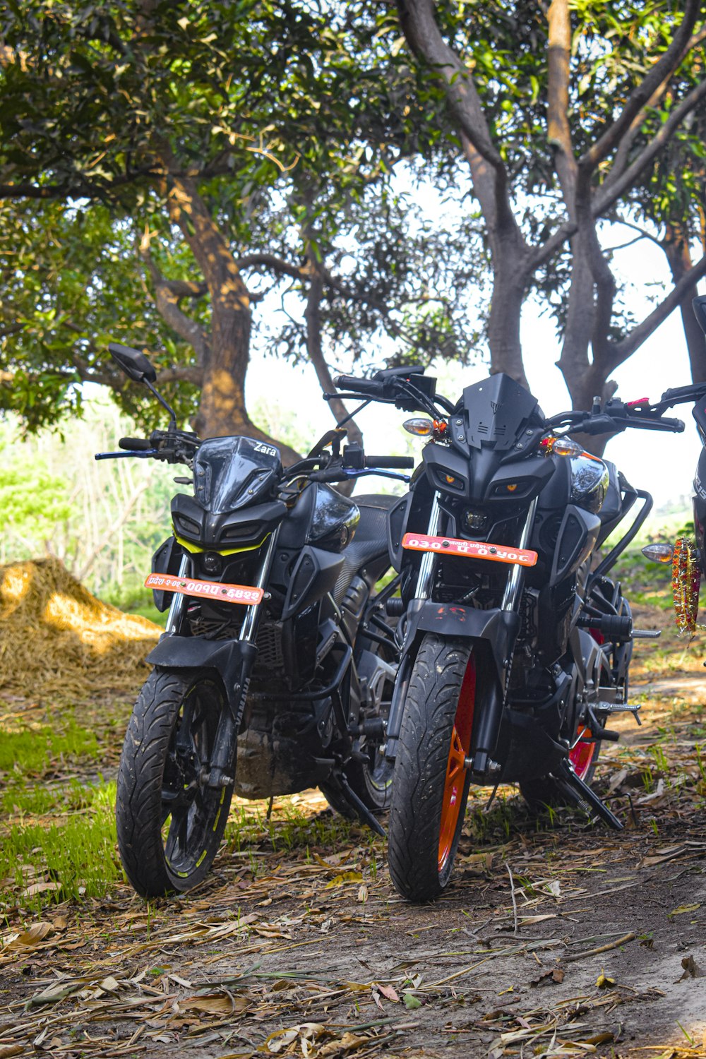 a couple of motorcycles parked next to each other