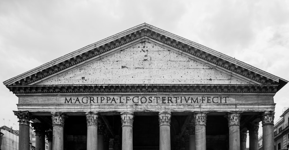 a black and white photo of a large building