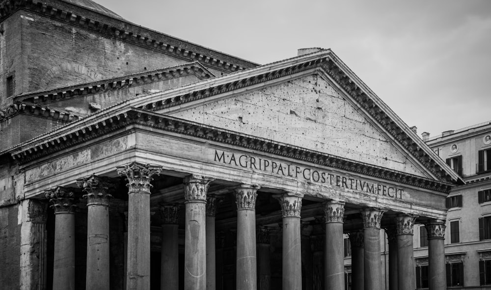 a black and white photo of the facade of a building