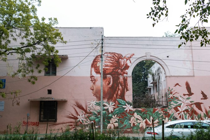 A large painted mural on the side of a building, the type of public art that both supporters and critics of the improvement district want to protect
