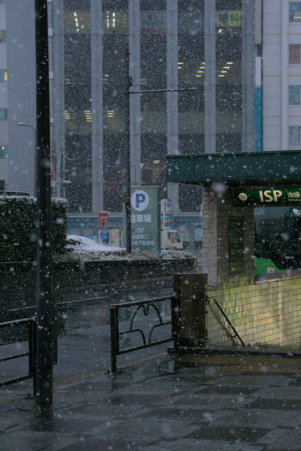 a train station in the middle of a snowy day