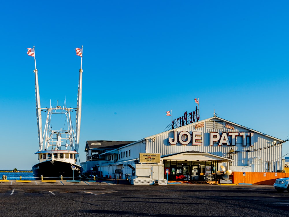 a large building with a boat in front of it