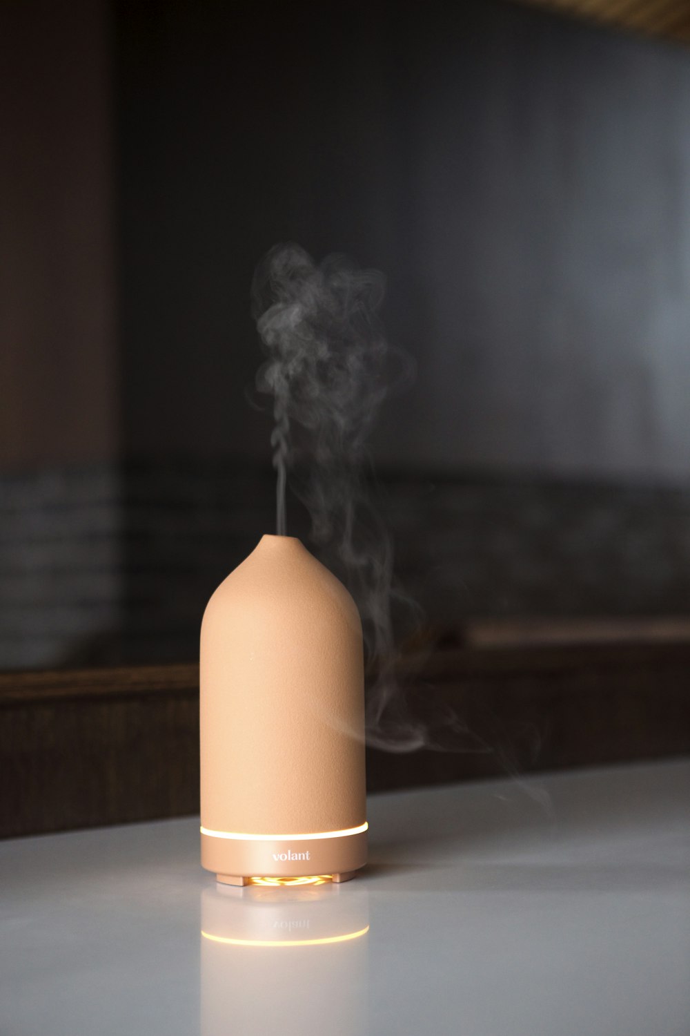 a humidifier sitting on top of a white counter