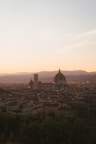 View of Palermo’s historic center from a suite balcony at sunset.