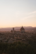 A captivating virtual tour interface showing a historic cityscape at sunset.
