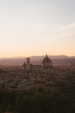 View of Palermo’s historic center from a suite balcony at sunset.