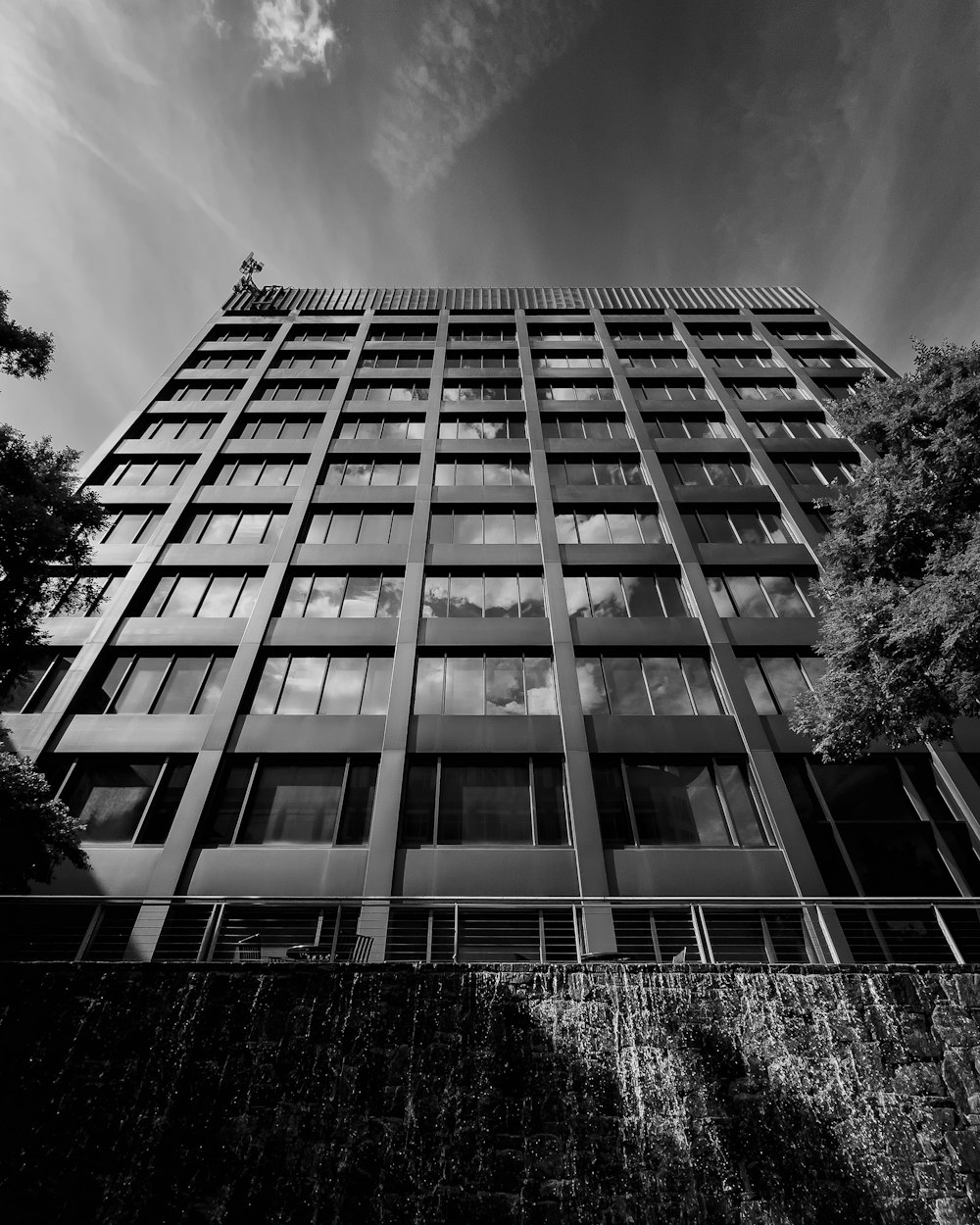 a black and white photo of a tall building