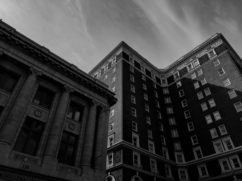 a black and white photo of a tall building