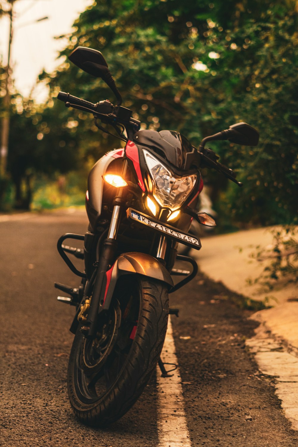 a motorcycle parked on the side of the road