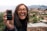 a woman taking a selfie with a camera