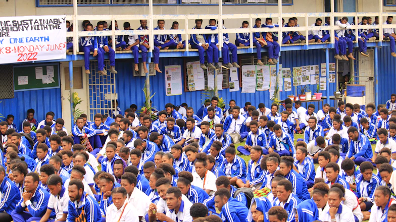 a large group of people in blue and white uniforms