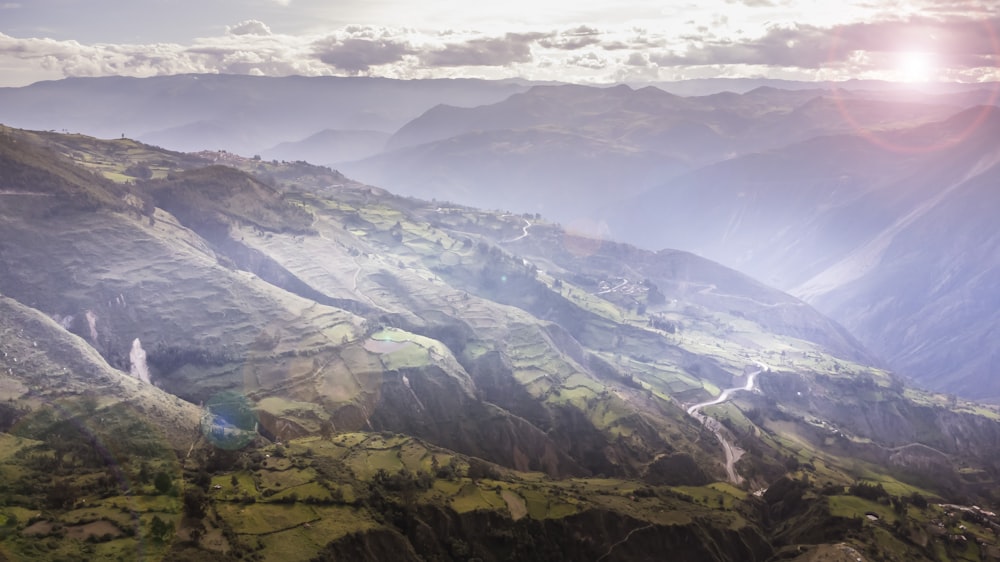 a view of a mountain range with a river running through it