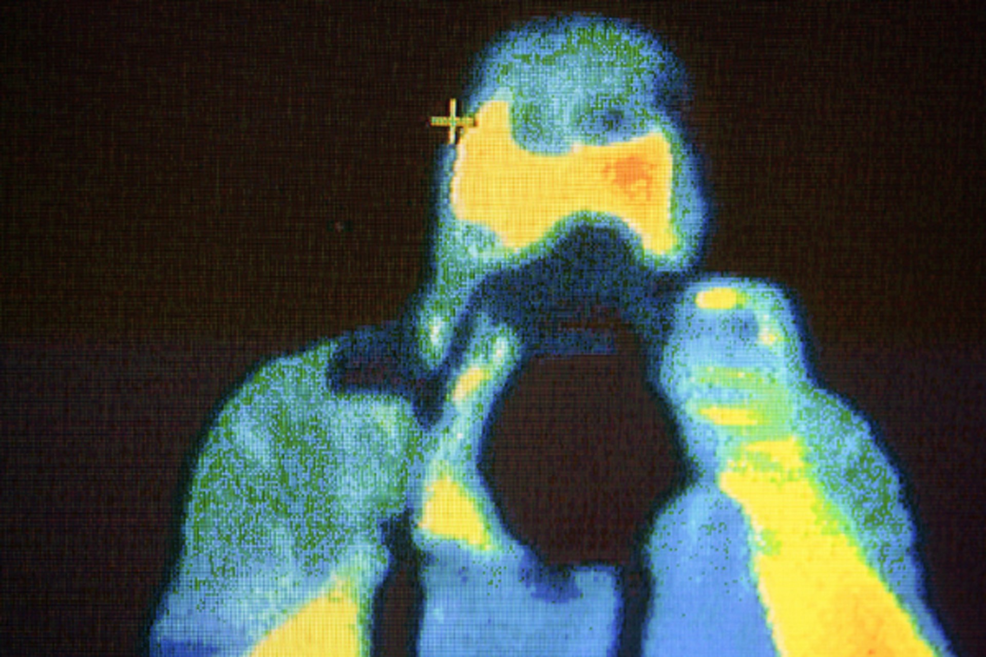 Animated thermal image camera capturing heat patterns on a glowing steel slab in a rolling mill.