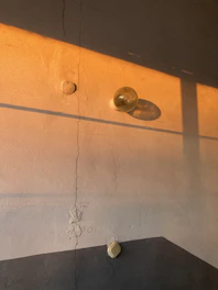 Close-up of smooth plastered walls with soft natural light highlighting the texture.