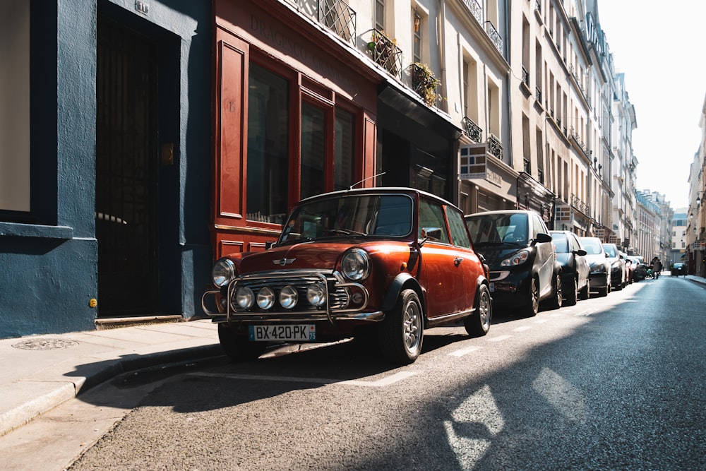 a small car parked on the side of a street