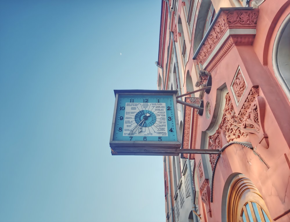 a clock on the side of a building