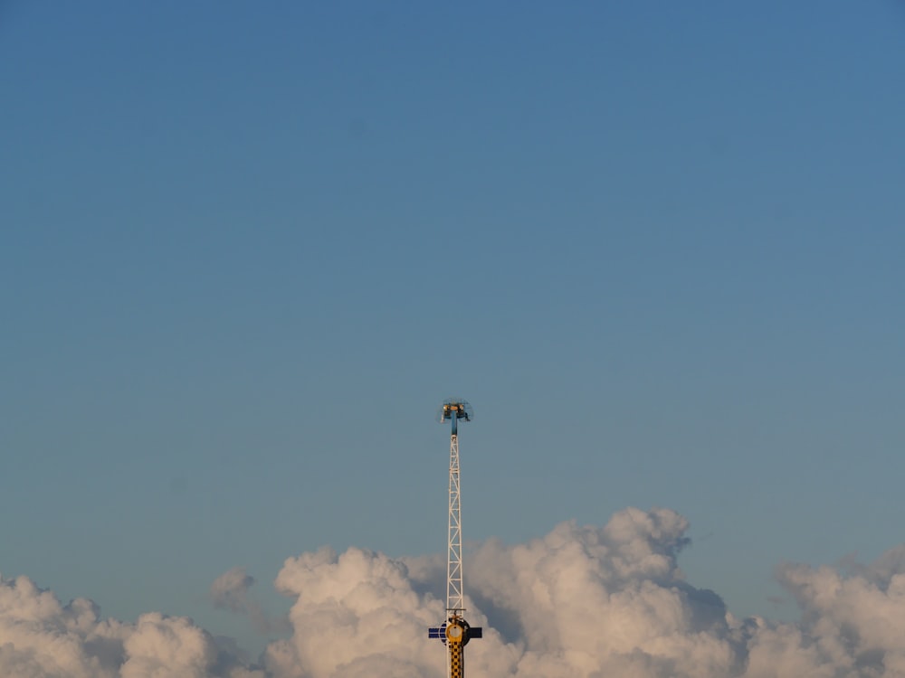 a tall tower with a radio antenna on top of it