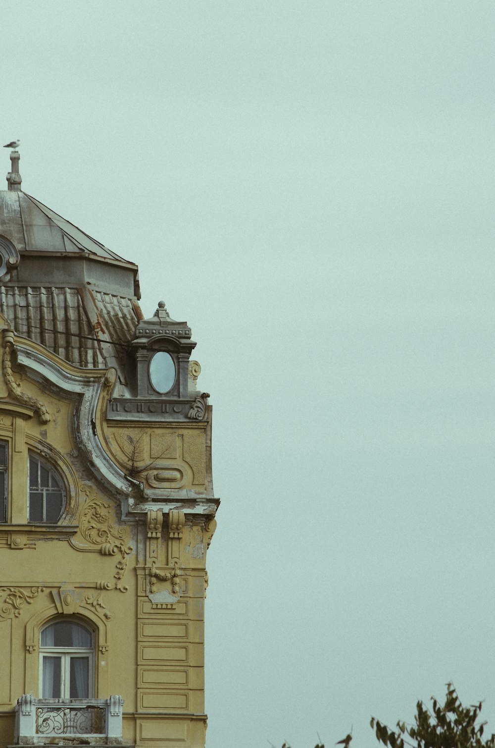 a tall building with a clock on the top of it