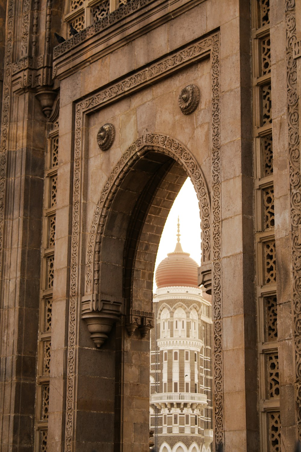 a tall building with a clock on it's side