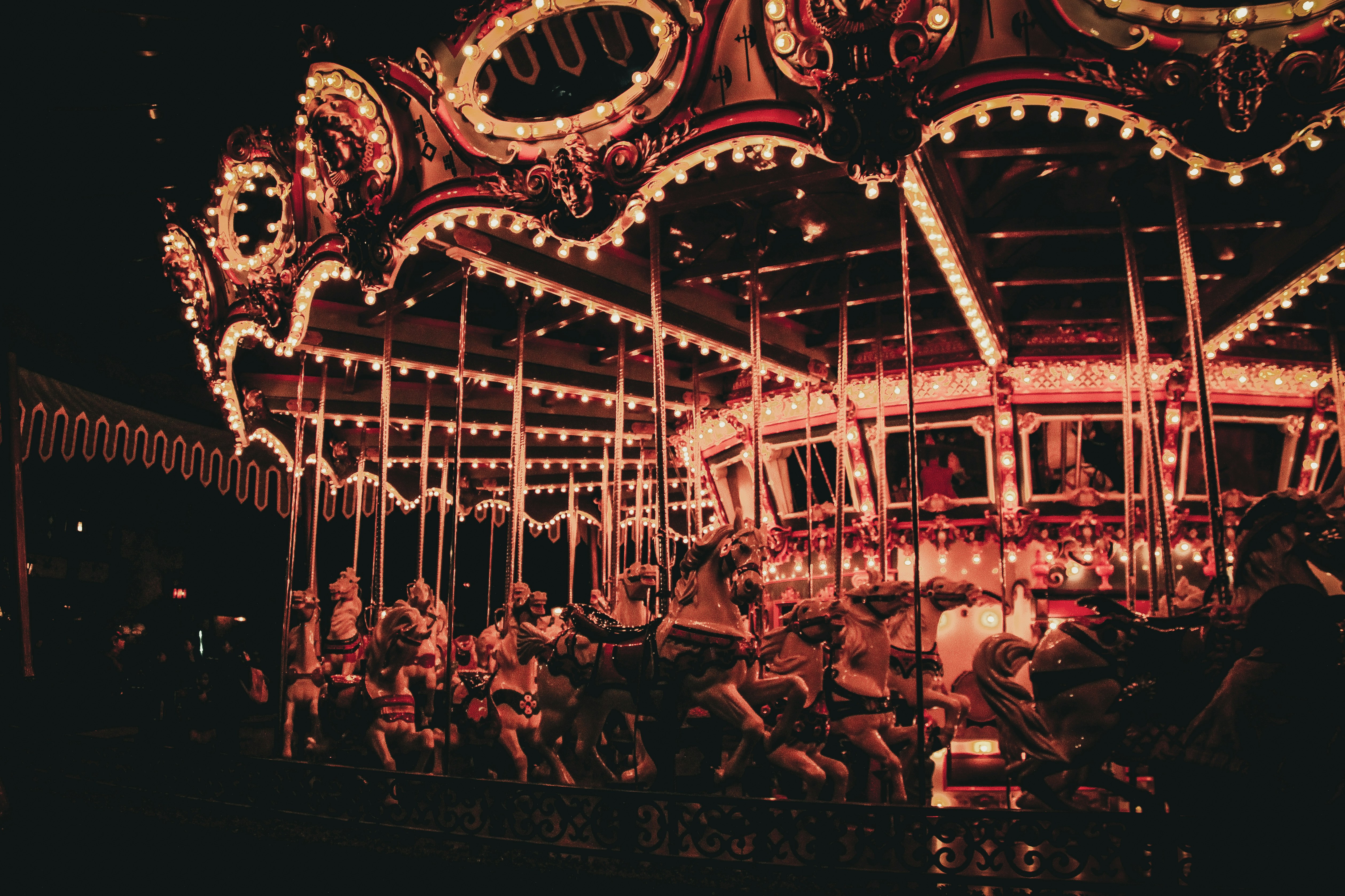 a merry go round at night with lights