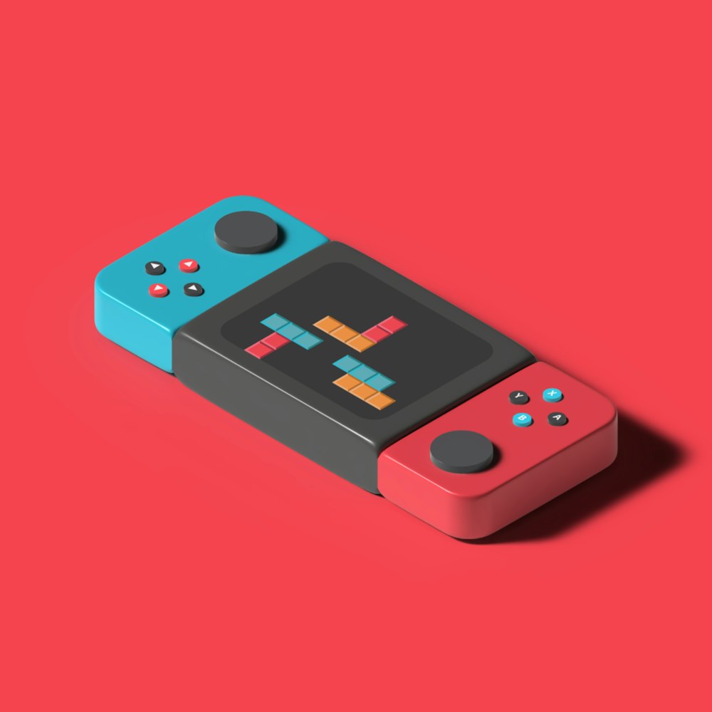 a nintendo wii game controller on a red background