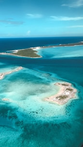 an aerial view of an island in the ocean