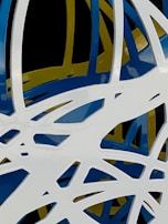 Original piece blending abstract forms with subtle automotive details in a minimalist palette.