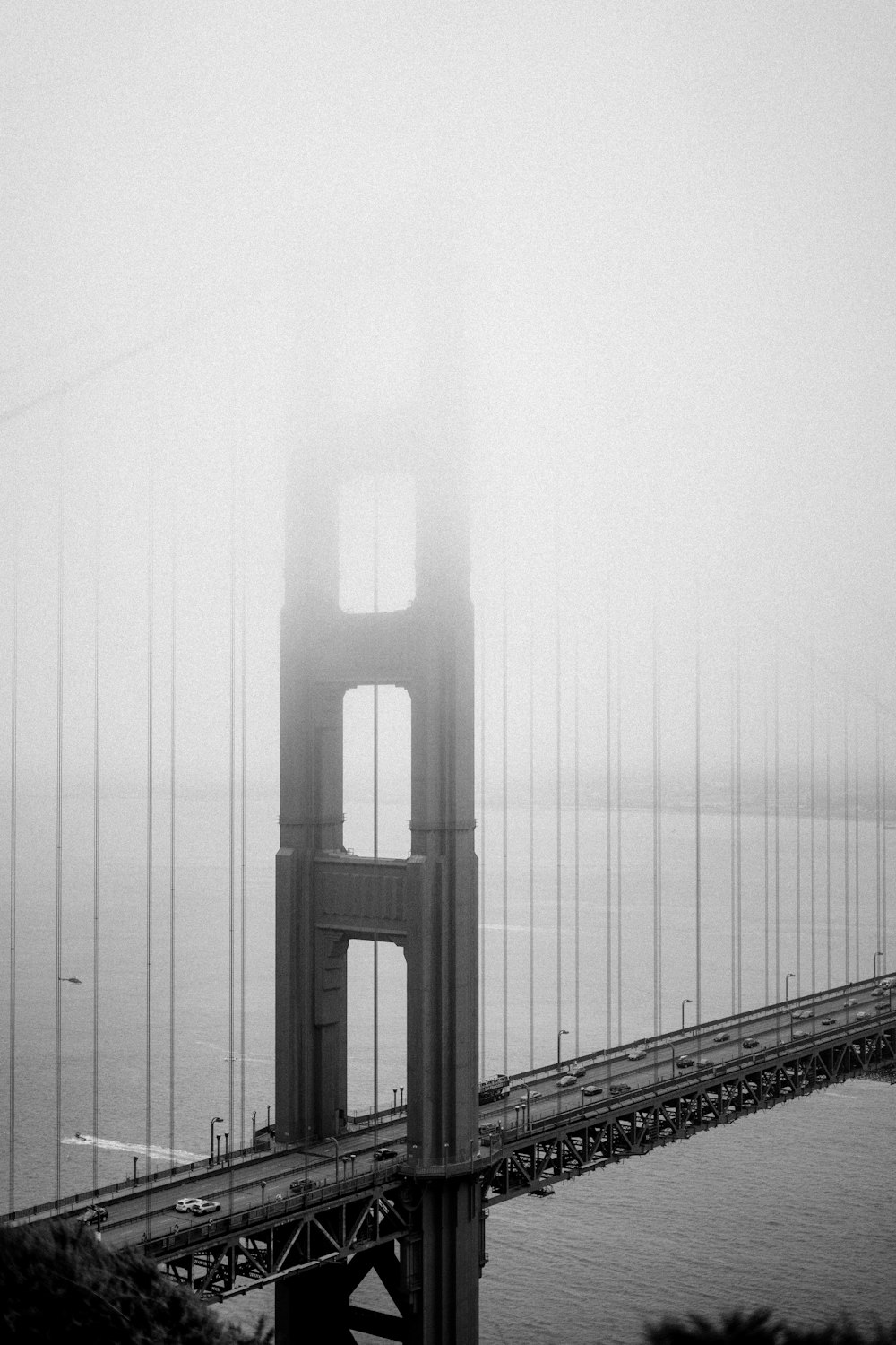 a foggy view of the golden gate bridge