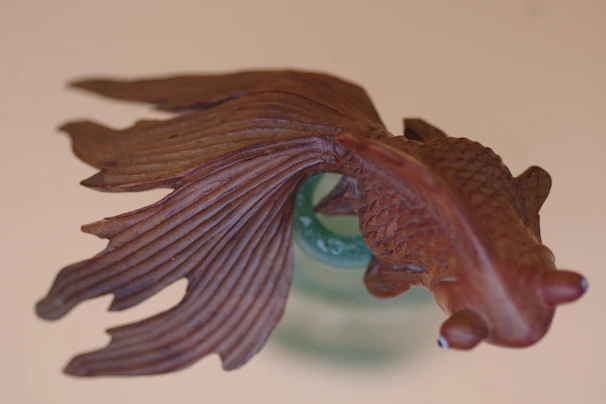 Close-up of a detailed axolotl sculpture blending natural textures with artistic flair