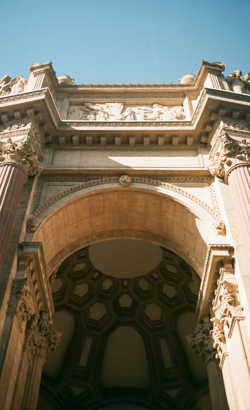 a tall building with a clock on the front of it