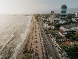 an aerial view of a beach and a city