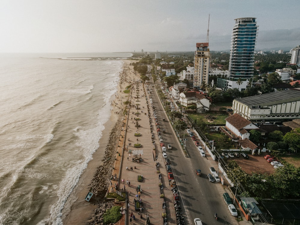 an aerial view of a beach and a city