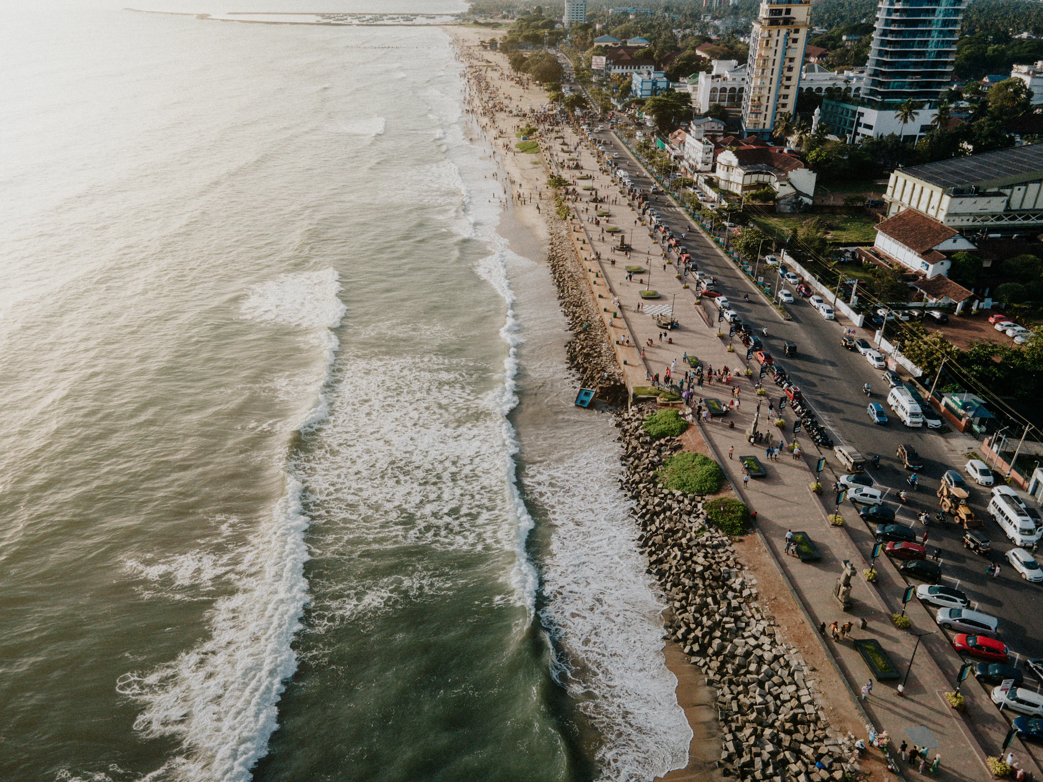 Aerial view of the Kozhikode shoreline with the city behind it