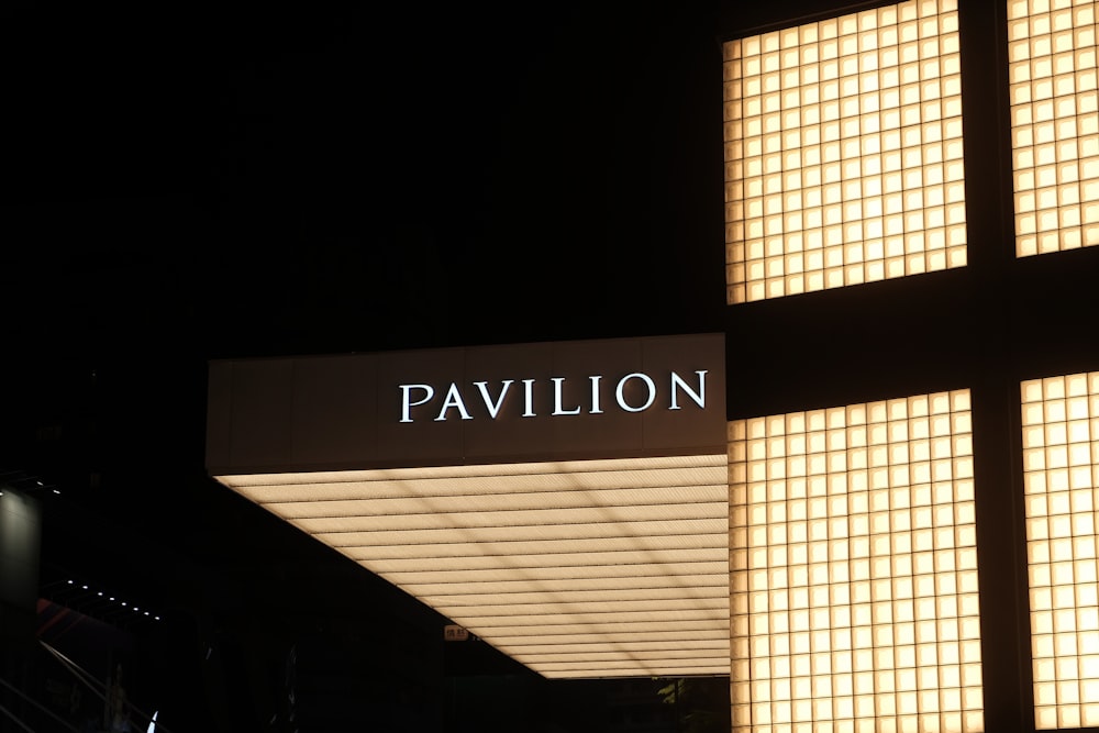 a sign that reads pavilion above a cross