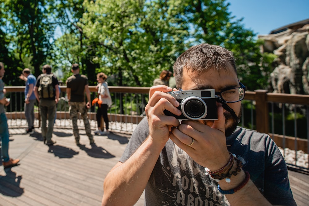 a man taking a picture of a group of people