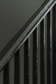 A close-up view of metal staircase railings and steps.