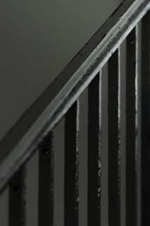 A close-up view of metal staircase railings and steps.