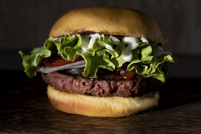 A classic burger served with fresh lettuce and tomato.