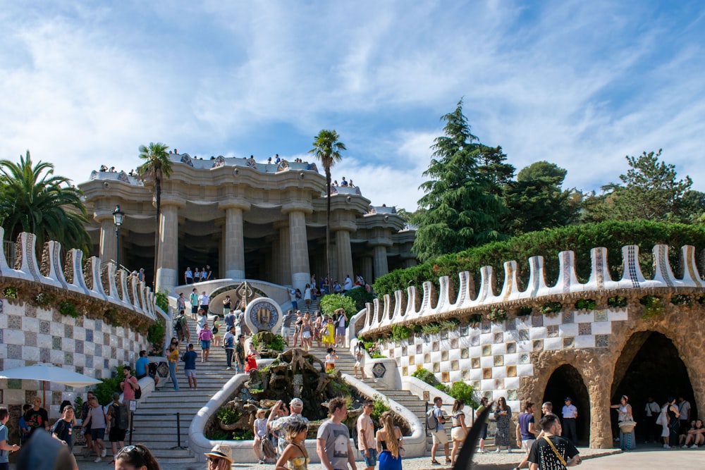 a group of people walking up and down a set of stairs