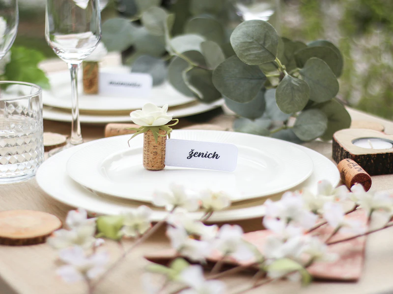 Place cards and a place setting on a wedding table